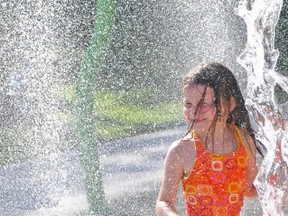 With hot, humid temperatures and possible thunderstorms, area youngsters are trying their best to beat the heat at the West Perth Splash Pad, not to mention the West Perth Lions Pool. KRISTINE JEAN/MITCHELL ADVOCATE