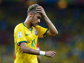 Brazil's Neymar reacts during Tuesday's World Cup match against Mexico at the Castelao arena in Fortaleza June 17, 2014. (REUTERS/Marcelo Del Pozo)