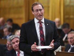 Canada's Justice Minister Peter MacKay speaks during Question Period in the House of Commons on Parliament Hill in Ottawa June 17, 2014. (REUTERS/Chris Wattie)