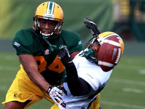 Eskimos safety Ryan Hinds, left, says after playing against Chris Jones's defence on other teams, there's a lot more to come. (Ian Kucerak, Edmonton Sun)
