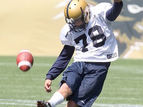 Winnipeg Blue Bombers kicker Lirim Hajrullahu kicks the ball during CFL football practice in Winnipeg, Man. Thursday May 29, 2014. 
Brian Donogh/Winnipeg Sun/QMI Agency