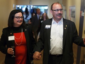 Progressive Conservative leadership candidate Ric McIver arrives with his wife Christine McIver at the PC Leadership Launch at the Ramada hotel in Edmonton, Alta., on Monday, June 2, 2014. (Ian Kucerak/QMI Agency)