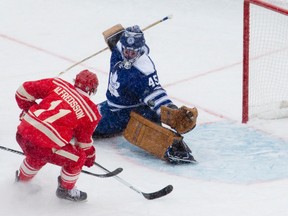 Detroit Red Wings forward Daniel Alfredsson scores on Maple Leafs goaltender Jonathan Bernier during the NHL Winter Classic at Michigan Stadium on January 1. (Craig Glover/QMI Agency)