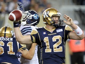 Winnipeg Blue Bombers quarterback Brian Brohm tosses the ball against the Toronto Argonauts during CFL football in Winnipeg, Man. Monday June 09, 2014.
Brian Donogh/Winnipeg Sun/QMI Agency