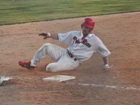 Tanner Waldvogel of the Portage Phillies slides into third during a game against the Winnipeg Stealers June 17. (Kevin Hirschfield/THE GRAPHIC)