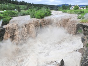 Lundbreck Falls spills its banks, west of Lethbridge, Alta., during flooding in southern Alberta in this file photo from June 20, 2013. (Bryan Passifiume/QMI Agency)
