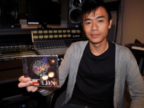Derek Leung, marketing director, CHRW Radio Western, holds a copy of LDN, a compilation album featuring local artists created in the campus radio station’s new recording space. CHRIS MONTANINI\LONDONER\QMI AGENCY