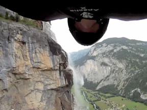 Jeb Corliss is the first person to fly through a waterfall in wingsuit, achieving speeds over 137 km/h. (Screenshot from YouTube)