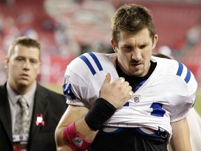 Indianapolis Colts tight end Dallas Clark leaves the field after their NFL football game against the Tampa Bay Buccaneers in Tampa Florida October 3, 2011. (REUTERS/Pierre DuCharme)