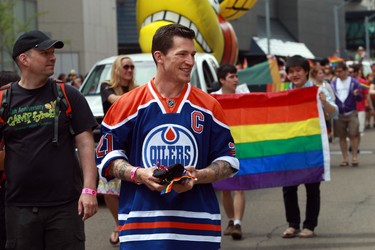 Edmonton Oilers' Andrew Ference marches in the Pride Parade in downtown Edmonton, Alta., on Saturday, June 7, 2014.  Perry Mah/ Edmonton Sun/ QMI Agency