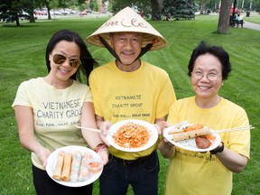 Alysha Vu, father Nhuong, and mother Tam Nguyen are getting ready to serve their favourite homemade Vietnamese dishes this weekend at the London International Food Festival at Victoria Park on Friday, Saturday and Sunday.  (DEREK RUTTAN/The London Free Press)