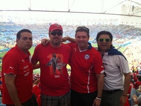 Derek Van Diest, second from the right, poses with his travelling companions, from left, Chris Urquijo, Marc Ciampa and Rod Urquijo, at Maracana Stadium in Rio de Janeiro Wednesday during the Chile-Spain match. (Derek Van Diest, Edmonton Sun)