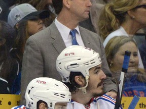 New York Rangers assistant coach Scott Arniel watches the action during Game 1 of the Stanley Cup final in Los Angeles. The Rangers have given the Canucks permission to talk to the Kingston native about Vancouver's vacant head coach's position. (Getty Images)