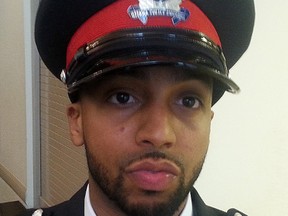 Liban Farah was sworn in as an Ottawa Police officer on Wednesday. (DOUG HEMPSTEAD Ottawa Sun)