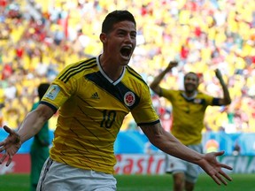 Colombia's James Rodriguez celebrates his goal against Ivory Coast during their World Cup match at the Brasilia national stadium on Thursday, June 19, 2014. (Paul Hanna/Reuters)