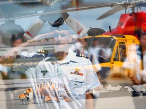 Lt. Col. Dany Poitras, 44 — portrayed here in a double exposure photograph — leads his first parade as commanding officer of 424 Transport and Rescue Squadron at 8 Wing/CFB Trenton, Ont. during a change of command ceremony where he succeeded outgoing CO Lt. Col. Jean Bernier Thursday morning, June 19, 2014. - JEROME LESSARD/THE INTELLIGENCER/QMI AGENCY