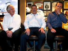 From left: Former Leafs GM Brian Burke, current Leafs GM Dave Nonis and Leafs captain Dion Phaneuf speak and share a laugh during a charity event on Wednesday night. (Craig Robertson/Toronto Sun)