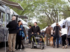 Shoppers walk through the 124 Grand Market, in Edmonton Alta., on Thursday May 29, 2014. The farmers market is located on 108 Avenue between 124 Street and 123 Street. David Bloom/Edmonton Sun