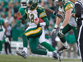 Mike Reilly, shown here running the ball against Saskatchewan in the season-ender last year, says it's nice to gauge the Eskimos’ progress against the current Grey Cup champions. (Reuters)