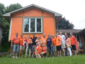 The VanLeeuwens painted the front of their home orange on Sunday to show their support for the Dutch soccer team. (CHRIS ABBOTT/QMI AGENCY)