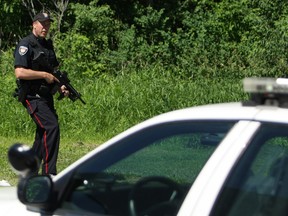 Charles H. Hulse Public School, Featherston Drive Public School, Alta Vista Public School and Ridgemont High School were all locked down Thursday after a student reported seeing a man with a gun. Doug Hempstead/Ottawa Sun