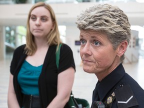 Cst. Anita Vallee (right) and Megan Antymis discuss the progress of the Police and Crisis Team (PACT) with the media after an Edmonton Police Commission meeting held at Edmonton City Hall in Edmonton, Alta., on Thursday, June 19, 2014. Ian Kucerak/Edmonton Sun/QMI Agency