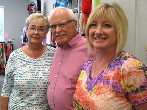 Jim Coyle is flanked by his wife Marlene and their daughter Tracey Haddy. The long-time owner of Janie's Fashions is the Thames Lea Plaza's only remaining original tenant, having opened the store 50 years ago this month. Coyle and his daughter are co-owners of the store today.
