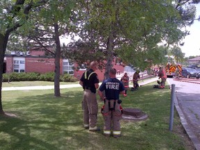 Toronto firefighters at Chalkfarm Public School on Friday. (CHRIS DOUCETTE/Toronto Sun)