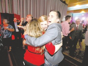 Supporters of Liberal Leader Kathleen Wynne celebrate at her election party headquarters in Toronto on June 12. (Mark Blinh/Reuters)