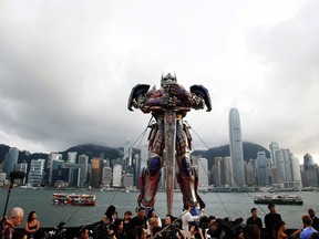 A 21-foot tall model of the Transformers character Optimus Prime is displayed on the red carpet before the world premiere of the film "Transformers: Age of Extinction" in Hong Kong June 19, 2014. (REUTERS/Tyrone Siu)