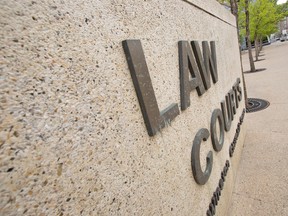 The Edmonton Law Courts, housing provincial courts, family courts, the Court of Appeal and Court of Queen's Bench, is seen in downtown Edmonton, Alta., Monday, June 9, 2014. Ian Kucerak/Edmonton Sun