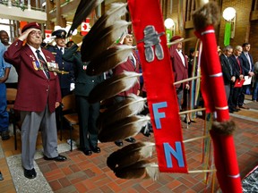 Retired Alberta Sergeant of Arms and military veteran Oscar Lacombe​ salutes during the opening of National Aboriginal Day.  Tom Braid/Edmonton Sun/ QMI Agency