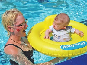 Mom Shantelle Welsh, from Vulcan, brought four-month-old Brad Lee Cooper Sparkes to the Vulcan Lions Swimming Pool last year when Canada Day events were put on by the Town of Vulcan Recreation Department. The recreation department has again lined up a pool party for July 1.
Advocate file photo