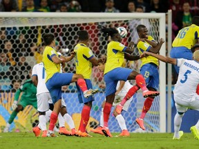 Victor Bernardez of Honduras attempts a free kick during their 2014 World Cup Group E soccer match against Ecuador at the Baixada arena in Curitiba on June 20, 2014. (REUTERS/Henry Romero)