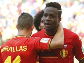 Belgium's Kevin Mirallas celebrates with teammate Divock Origi  (R) who scored a goal during their 2014 World Cup Group H soccer match against Russia at the Maracana stadium in Rio de Janeiro June 22, 2014. (REUTERS/Yves Herman)