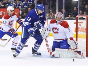 Toronto Maple Leafs Joffrey Lupul and Montreal Canadiens goalie Carey Price during action at the Air Canada Centre in Toronto on Saturday March 22, 2014. (Ernest Doroszuk/Toronto Sun)