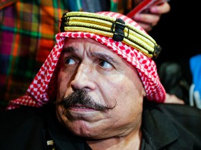 Legendary wrestler Iron Sheik shows up at Toronto City Hall to try to meet with Mayor Rob Ford in Toronto, Ont. on Wednesday November 6, 2013. (Ernest Doroszuk/QMI Agency)