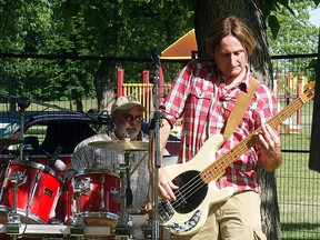 Rob Countryman of the band Pull-3 jams at the Sombra Optimist Car Show, along with drummer Chipper Lusk held at Brander Park on Saturday.