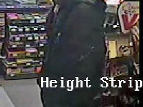 Ottawa Police are seeking this man in connection with two robberies at stores on Bronson and Bank streets. (OTTAWA POLICE submitted image)