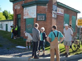 A group trying to preserve the old Bailey Broom factory, slated for demolition, is urging city council to meet to review the plans.