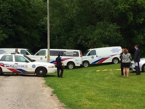 Toronto Police forensic units are seen at a North York park where human remains were found Monday morning. (ERNEST DOROSZUK/Toronto Sun)