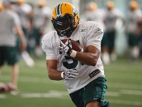 Calvin McCarty, shown here during camp, cites Mike Reilly's athleticism as a reason why he's glad the QB's contract was extended. (Ian Kucerak, Edmonton Sun)