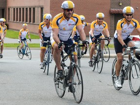 Sun Life Financial’s Epic Cycle for Diabetes rides into City Place One in Kingston. (Alex Pickering/For The Whig-Standard)