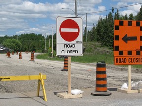 Traffic signs divert motorists from MacLean Drive at Victoria Avenue where extensive improvements are being made including a sidewalk installation and extending watermains and sanitary sewers. Road construction in Timmins is hitting its seasonal peak and motorists can expect to encounter a number of detours over the next while.