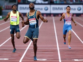 LaShawn Merritt, centre, crosses the finish line to win in the men's 400m event during during the Golden Gala IAAF Diamond League at the Olympic stadium in Rome June 5. (Reuters)