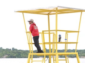 Gino Donato/The Sudbury Star
Lifeguard Cody Malette patrols the main beach at Bell Park on Monday afternoon.