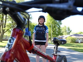 JOHN LAPPA/THE SUDBURY STAR/QMI AGENCY
Audrey O'Brien, of the Northern Initiative for Social Action, is riding around Greater Sudbury promoting a fundraising dinner with Olympian Clara Hughes on June 27, 2014 at the Steelworkers Hall in Sudbury, ON.