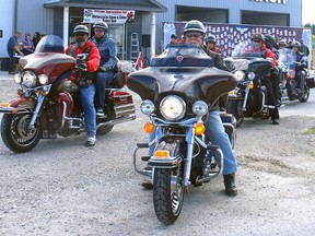 The first group of motorcycles leaves Dutton Saturday on the Veterans Appreciation Day Motorcycle Rally and Poker Run. In the front row, right, is Dutton/Dunwich Deputy Mayor Bob Purcell. Approximately 50 people including motorcycle owners and their passengers, covered a 150-kilometre route across Southwestern Ontario.