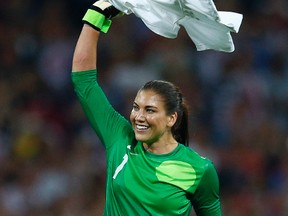 Goalkeeper Hope Solo of the U.S. celebrates winning their women's soccer final gold medal match against Japan at Wembley Stadium during the London Olympics on August 9, 2012. (REUTERS/Brian Snyder)