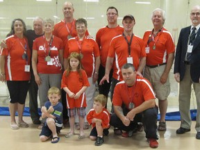 Members of the Apollo Barbell Club brought home 15 medals from the Pan Am and Canadian Masters weightlifting championships held recently in Scarborough. Back row from left: Joanne Moring, Manley Bly, Shirley Bly, Sean Gawley, Christine Walt, Tony Walt, Bob Walt, Joel Carr-Braint and Donald Buchanan. In front: supporters Jake Gawley, Julia Walt, Lincoln Walt and lifter Ken Gorman. (PHOTO SUBMITTED)